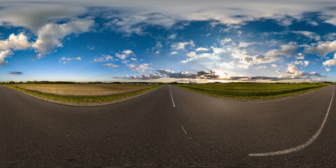 full seamless spherical hdri 360 panorama view on no traffic asphault road among fields with...