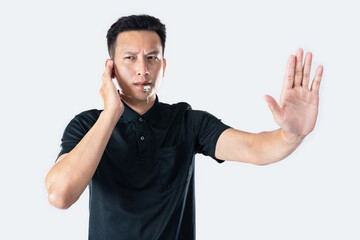 Football referee showing VAR symbol.