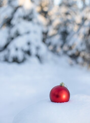 Christmas tree balls on white snow. Christmas card. Soft focus
