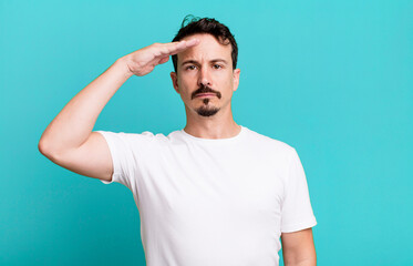 greeting the camera with a military salute in an act of honor and patriotism, showing respect
