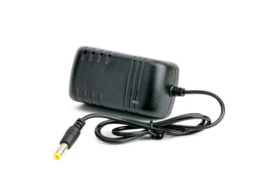 the power adapter is black on a white background
