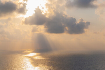 Sea. Sunset with beams