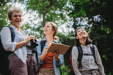 woman family or friends group trekking travel in adventure lifestyle, nature mountain hiking in vacation holiday with journey of holiday maker in happy leisure together in summer of backpacker trip