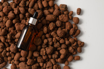 Bear oil man on broun stone. Man oil for beard.