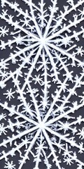 A single snowflake falling through the air is caught in sharp focus against a dark background. The intricate six-sided symmetry of the ice crystal is amazing to behold up close. Each individual point 