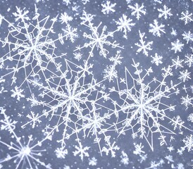 A delicate snowflake crystal is magnified many times over, its six-fold symmetry on full display. Its icy wings are like fragile lace, each detail unique and exquisite.