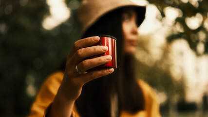 Mug of tea in hand close up