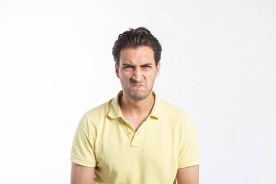 Close up portrait of angry stressed man isolated on white background