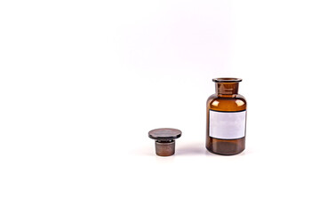 Brown medical jar isolated on white background with blank label