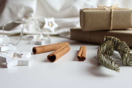 Cinnamon sticks. Happy New Year decoration on plush bedspread with New Year's Eve decoration, concept image, free space for an inscription
