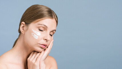 A young caucasian woman posing with face mask