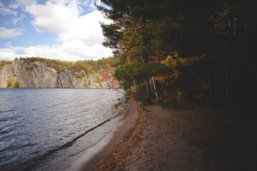 Bon Echo Provincial Park in Ontario, Canada. A spectacular landmark in North America alongside Mazinaw Lake. Autumn leaves and fall colors late in the season making for a beautiful landscape.