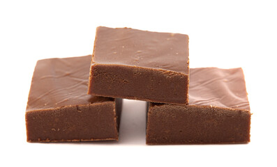 A Cube of Plain Chocolate Fudge Isolated on a White Background