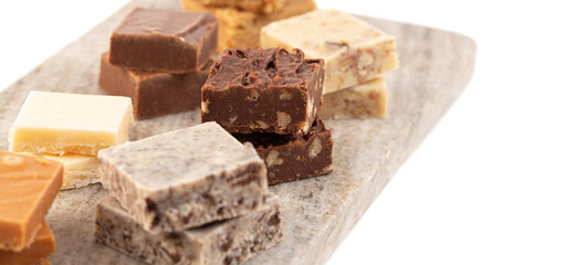 Assortment of Various Flavors of Fudge Isolated on a White Background
