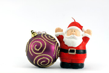 Dark red Christmas ball with gold stripes and a Santa claus  isolated on white background