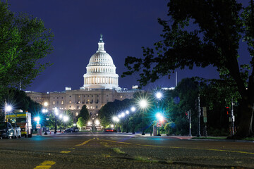 The United States Capitol building in Washington DC at night