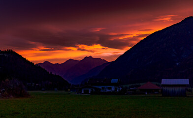 red sunset in mountains