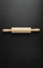Empty baking background. For posting your products. Table with scattered flour and rolling pin. Top view. Flat lay.