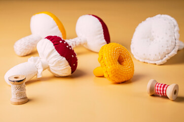 mushrooms sewn from cotton fabric. stuffed toys in the shape of a mushroom