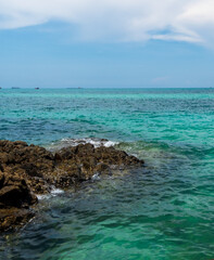Landscape summer panarama tropical sea beach rock blue sky white sand background calm Nature ocean...