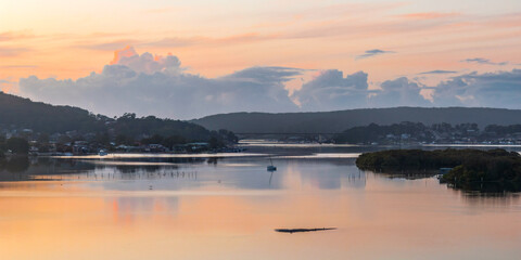 Soft and subtle sunrise waterscape over the bay