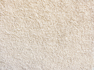 Light beige grainy ground texture background. Background and textures.