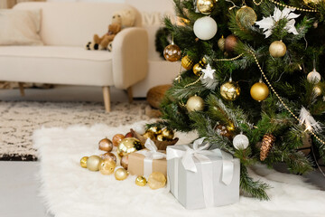 Beautiful Christmas tree in decorated living room. Festive interior