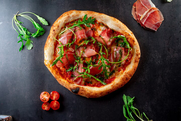 pizza with salami and tomatoes