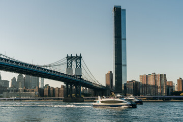 Fototapeta na wymiar Brooklyn bridge view to Downtown Manhattan, New York, United States. 03.07.2022