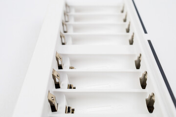 Cells with contacts for charging rechargeable batteries with selective focus and blurred background.