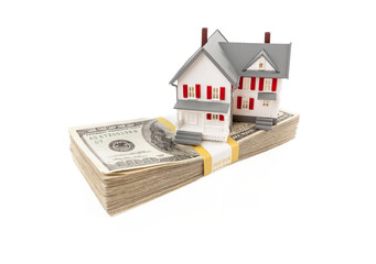 Transparent PNG Small Model House on Stacks of Hundred Dollar Bills.