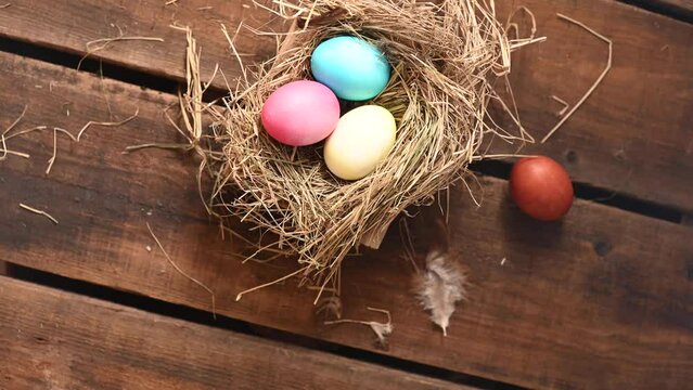 Colored onion husks are Easter eggs in a nest. Traditions Orthodoxy religion. High quality 4k footage