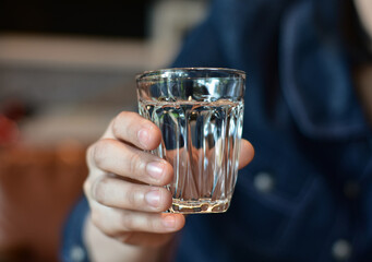 A glass is a glass for holding a drink in hand.