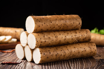 fresh Chinese yam on wooden table
