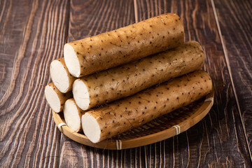 fresh Chinese yam on wooden table