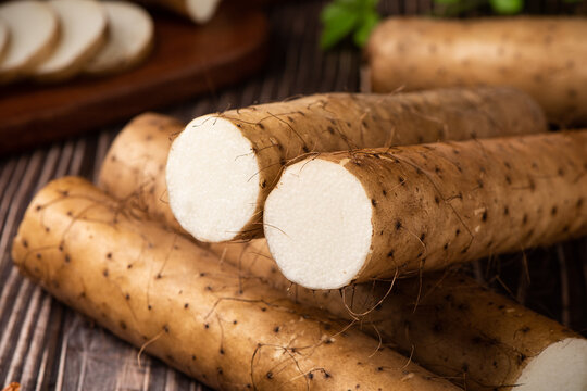 fresh Chinese yam on wooden table