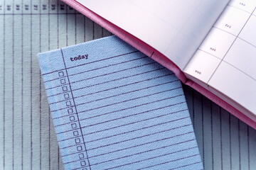 Light blue and pink pastel notebooks, to do list, day planner, productivity