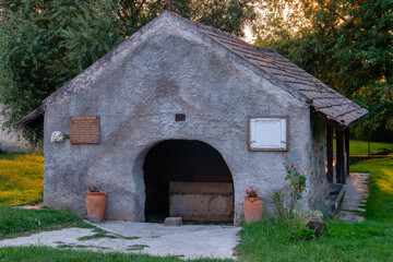 Fototapeta na wymiar Public washhouse built on a spring used to serve the whole village - Koveskal, Hungary