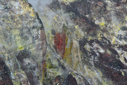 Sulfur gases and deposits in volcano.