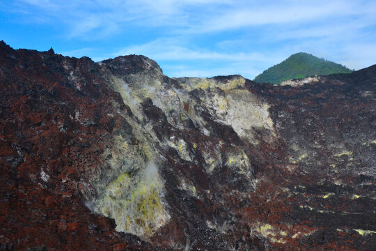 Volcano side with Mountain peaks.