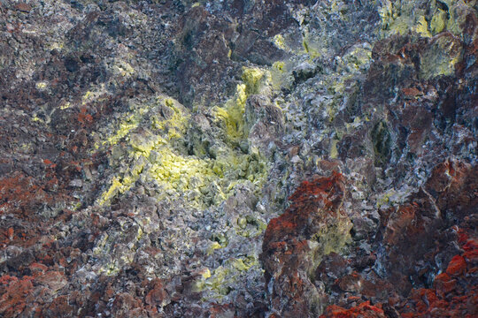 Sulfur gases and deposits in volcano.