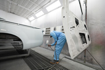 Standard auto repair shop is repairing and repainting the car after the accident.