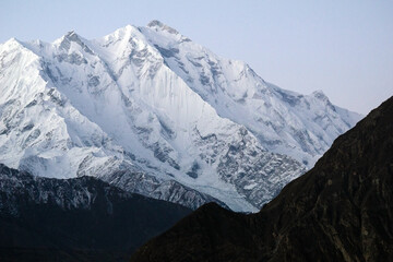Fototapeta premium Rakaposhi is a mountain in the Karakoram mountain range of the Gilgit-Baltistan, territory of Pakistan. With elavation of 7,788m from sea level, its not easy to climb from in any direction. 