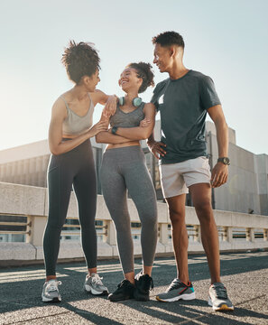 City running friends, group smile and laugh together on road after run in town for outdoor summer workout, fitness exercise and training for marathon. Happy black athletes, man and women after cardio