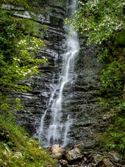 tall waterfall in Arkansas in summer