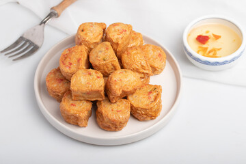Deep Fried Chicken Roll in a white plate