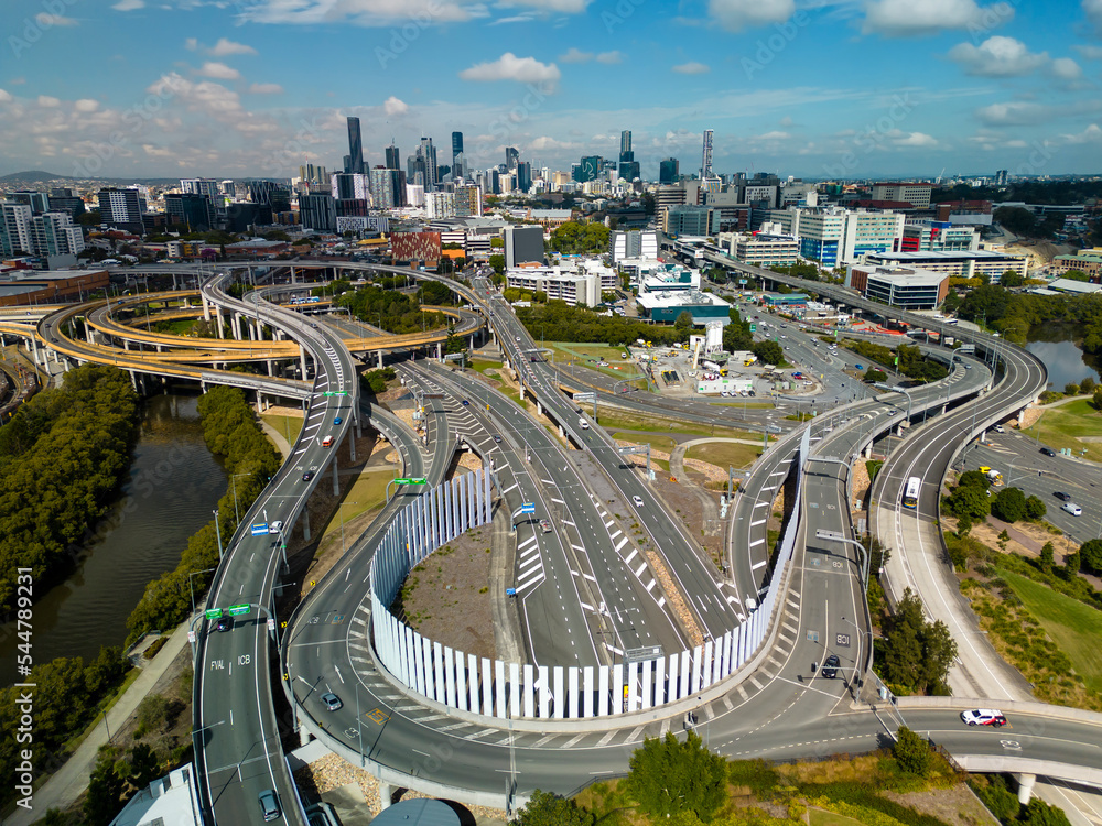 Poster aerial view of brisbane city and highway traffic in australia in daytime