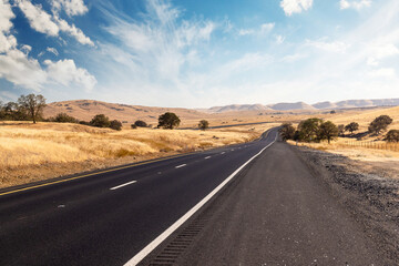 Asphalt road and countryside landscape