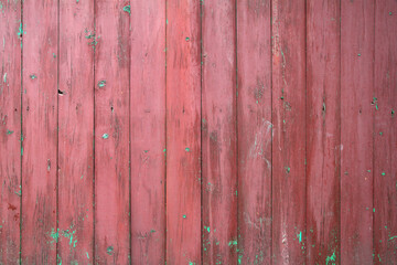 Old wooden painted wall, red board, village gate