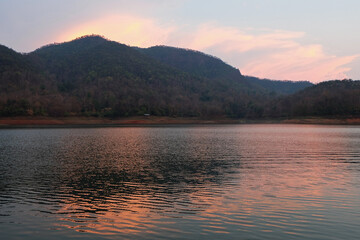 Sunset with natural landscape of mountain and lake view